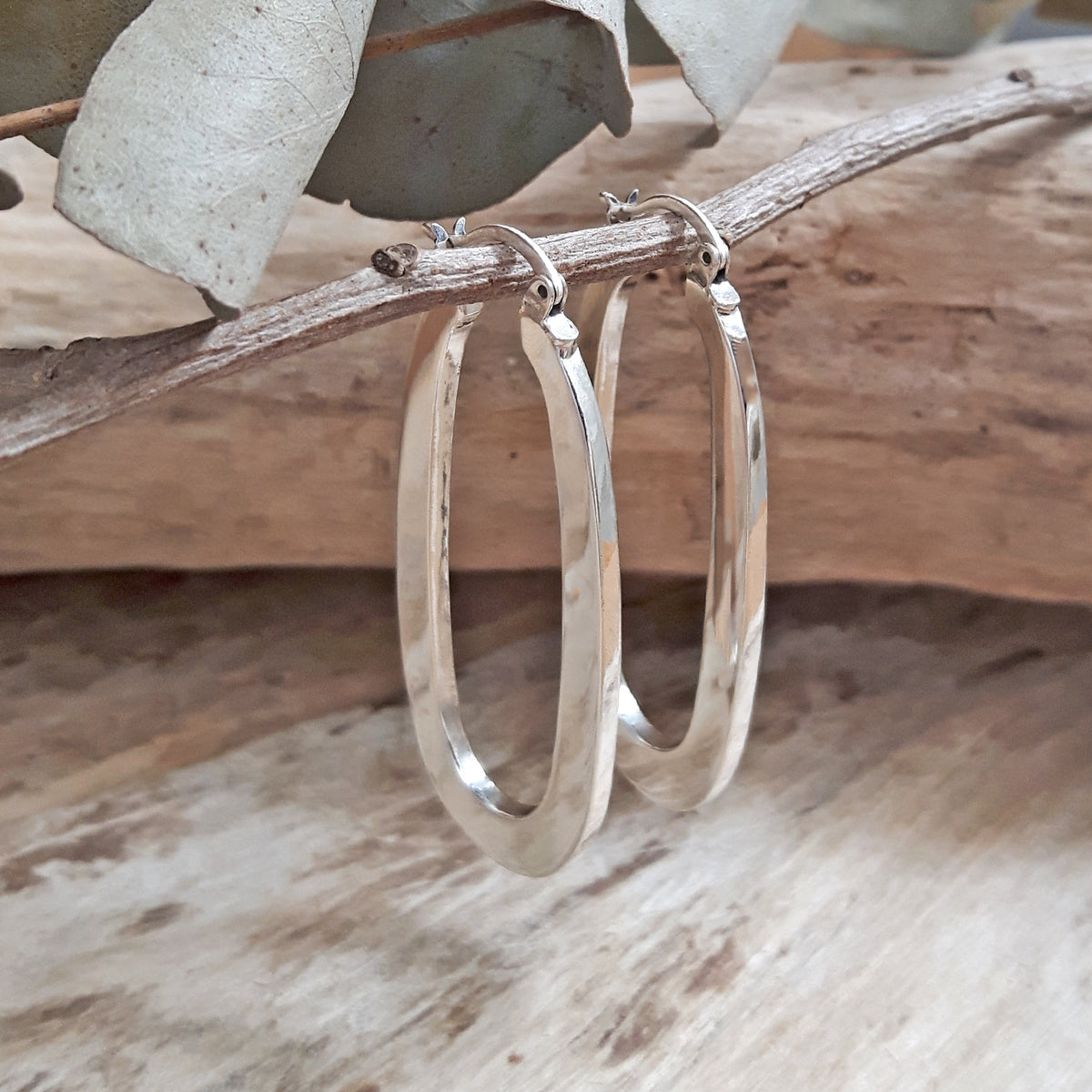Ameli Oval Sterling Silver Hoop Earrings