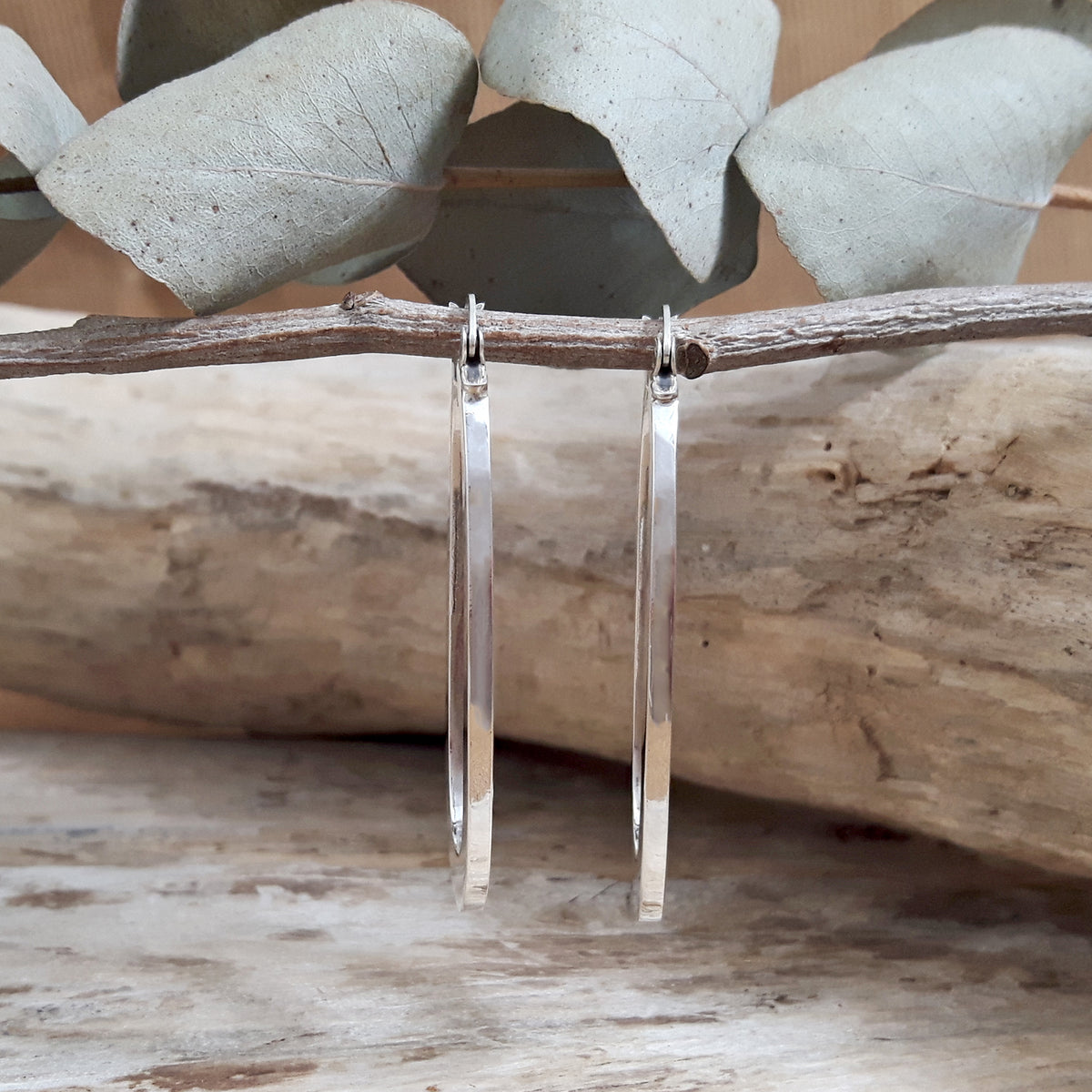 Ameli Oval Sterling Silver Hoop Earrings