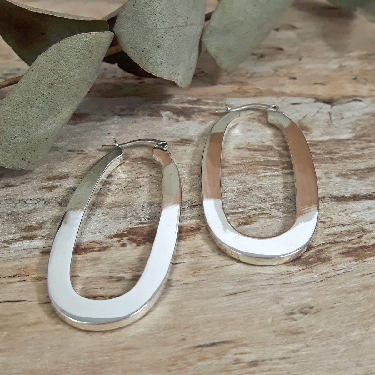 Ameli Oval Sterling Silver Hoop Earrings