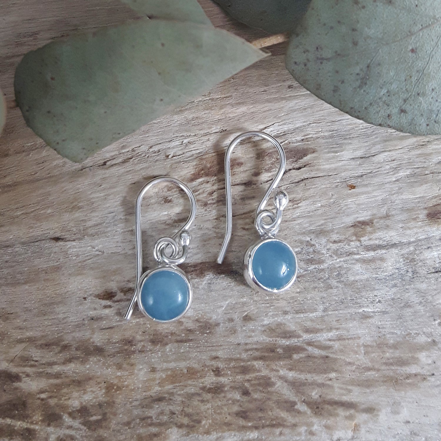Round aquamarine gemstone earrings on sterling silver hooks