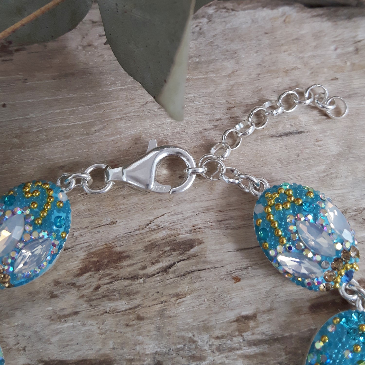 close up opal bracelet crystal silver clasp detail