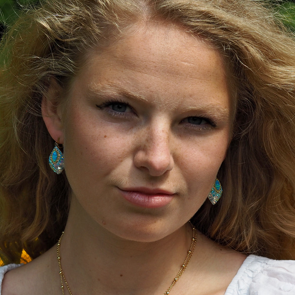 turquoise opal earrings worn by model statement jewellery