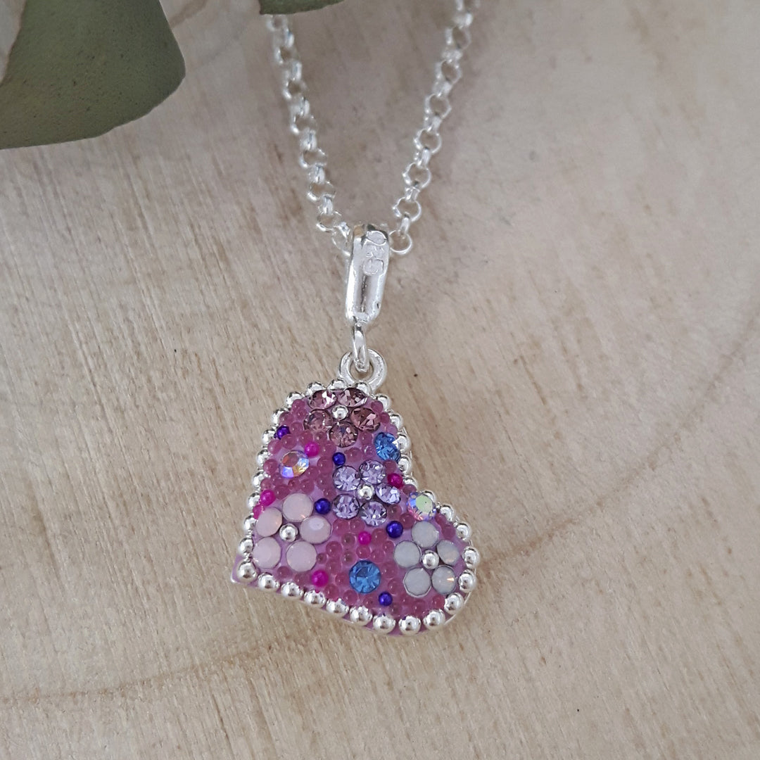 close up lilac heart pendant detail