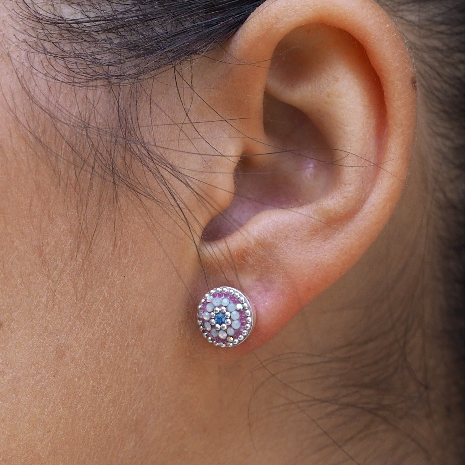 lilac stud earrings worn on ear everyday jewellery
