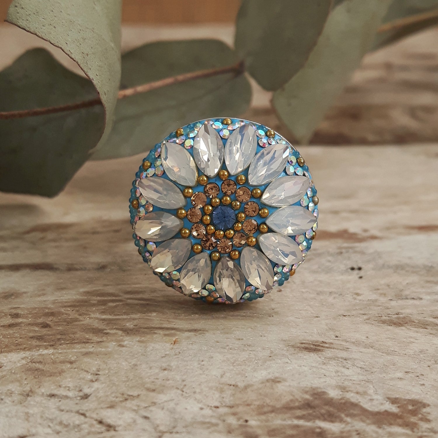close up daisy disc ring crystal and micro bead detail from front
