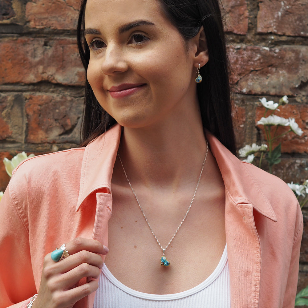 turquoise heart drop earrings worn on model with matching pendant lightweight