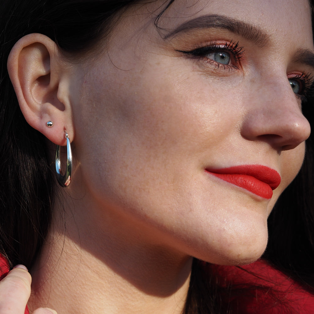 Rowena Oval Polished Silver Hoop Earrings