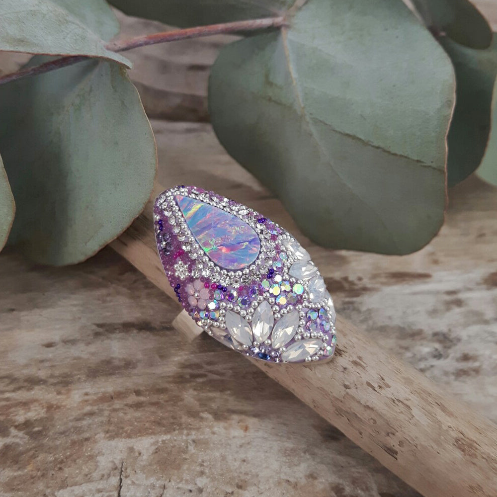 close up lilac ring opal centre detail