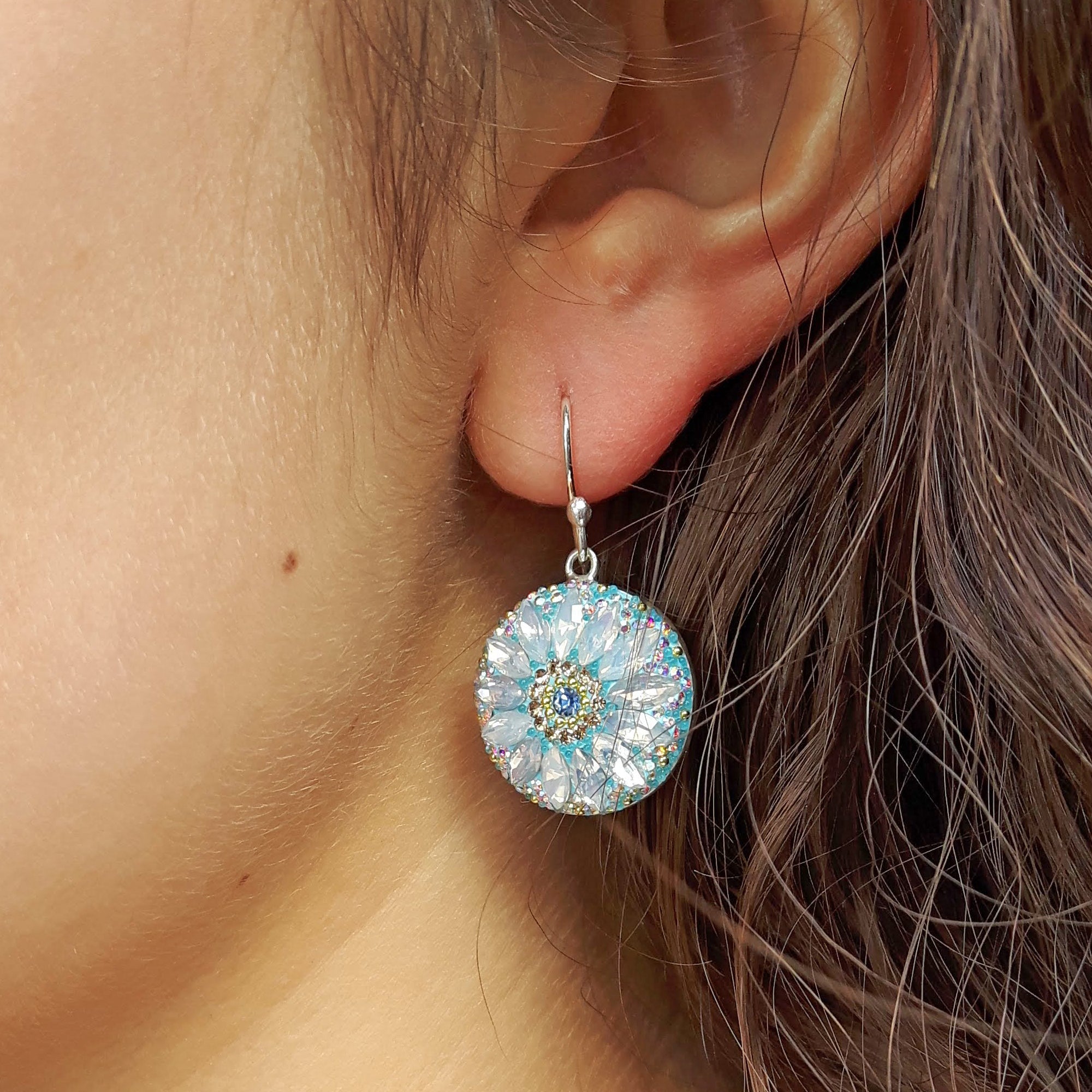 turquoise daisy disc earrings sterling silver handmade floral jewellery worn in ear