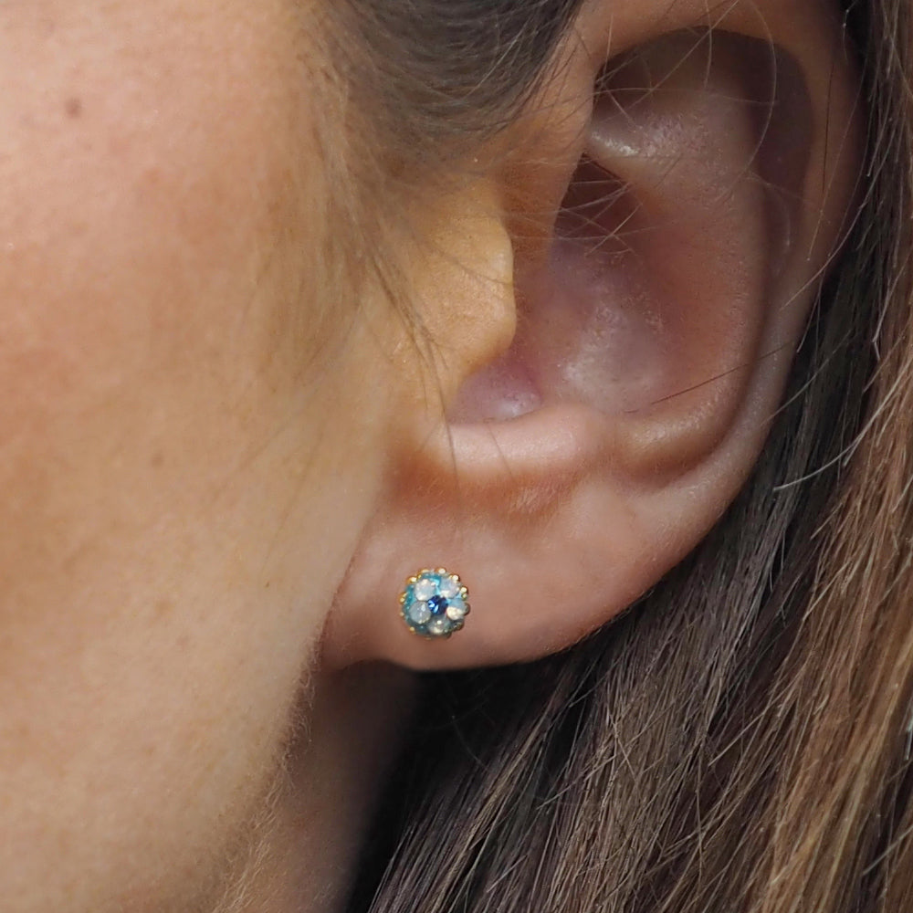lightweight small turquoise stud earrings worn on ear