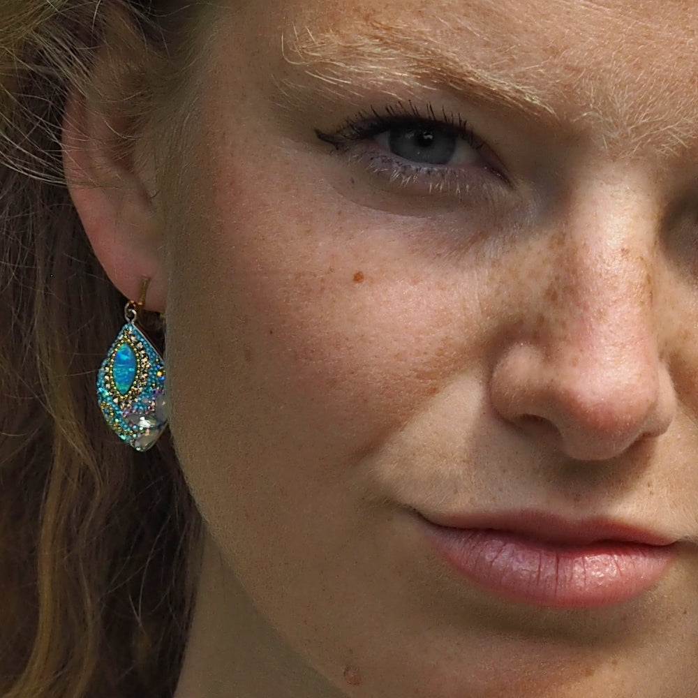 turquoise opal earrings worn on ear statement
