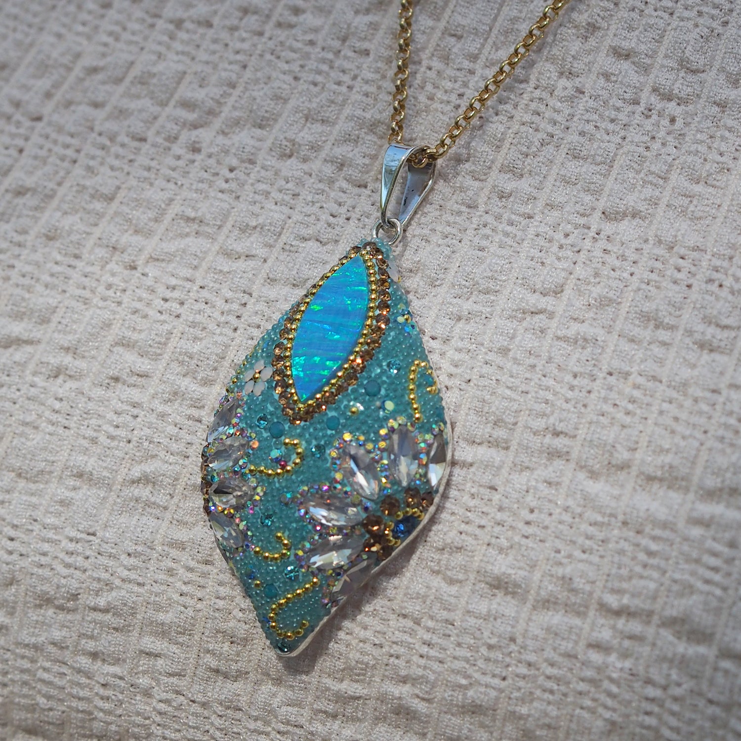 statement pendant worn necklace opal turquoise jewellery side view

