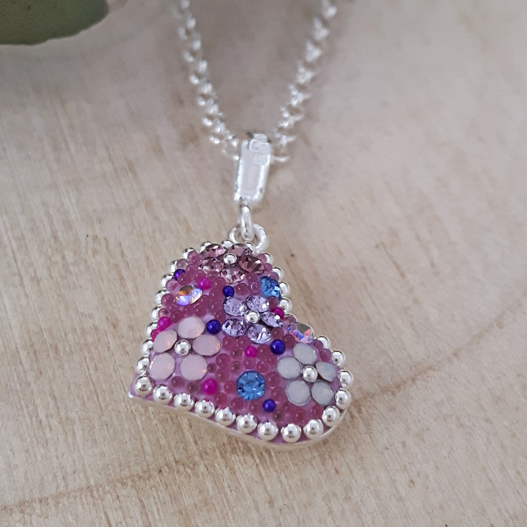 heart pendant opalescent crystal detail