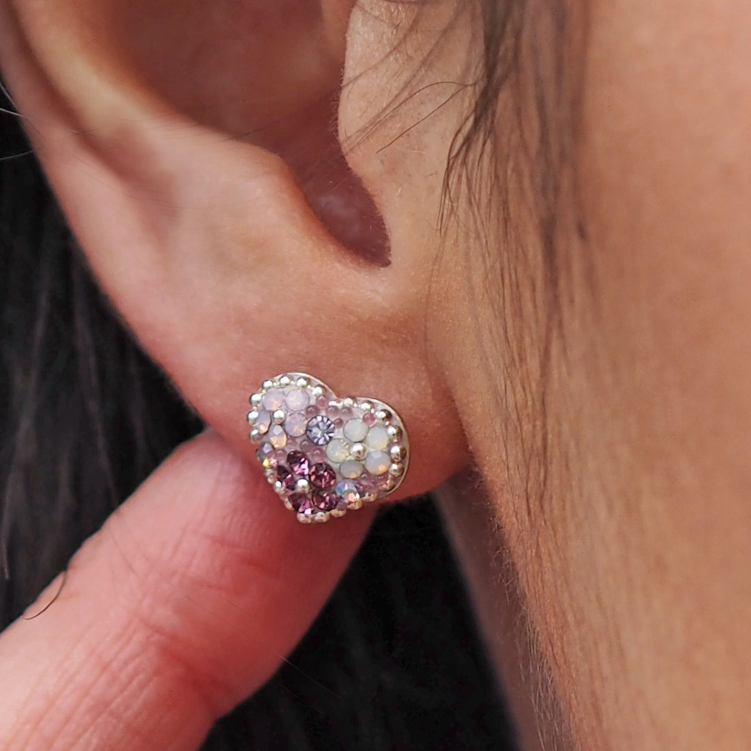 close up lilac heart studs micro bead detail worn in ear