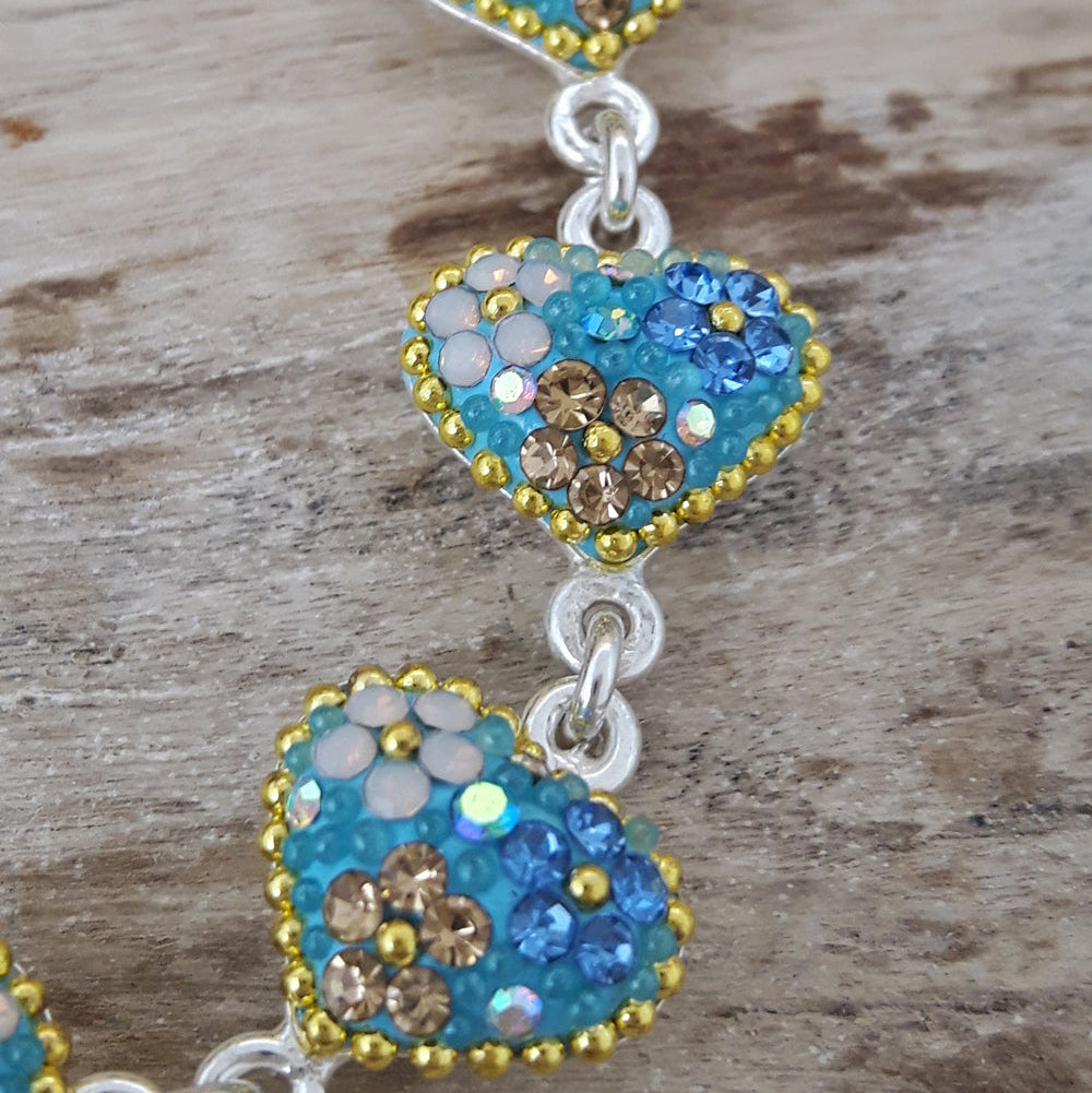 close up heart bracelet crystal and micro bead detail
