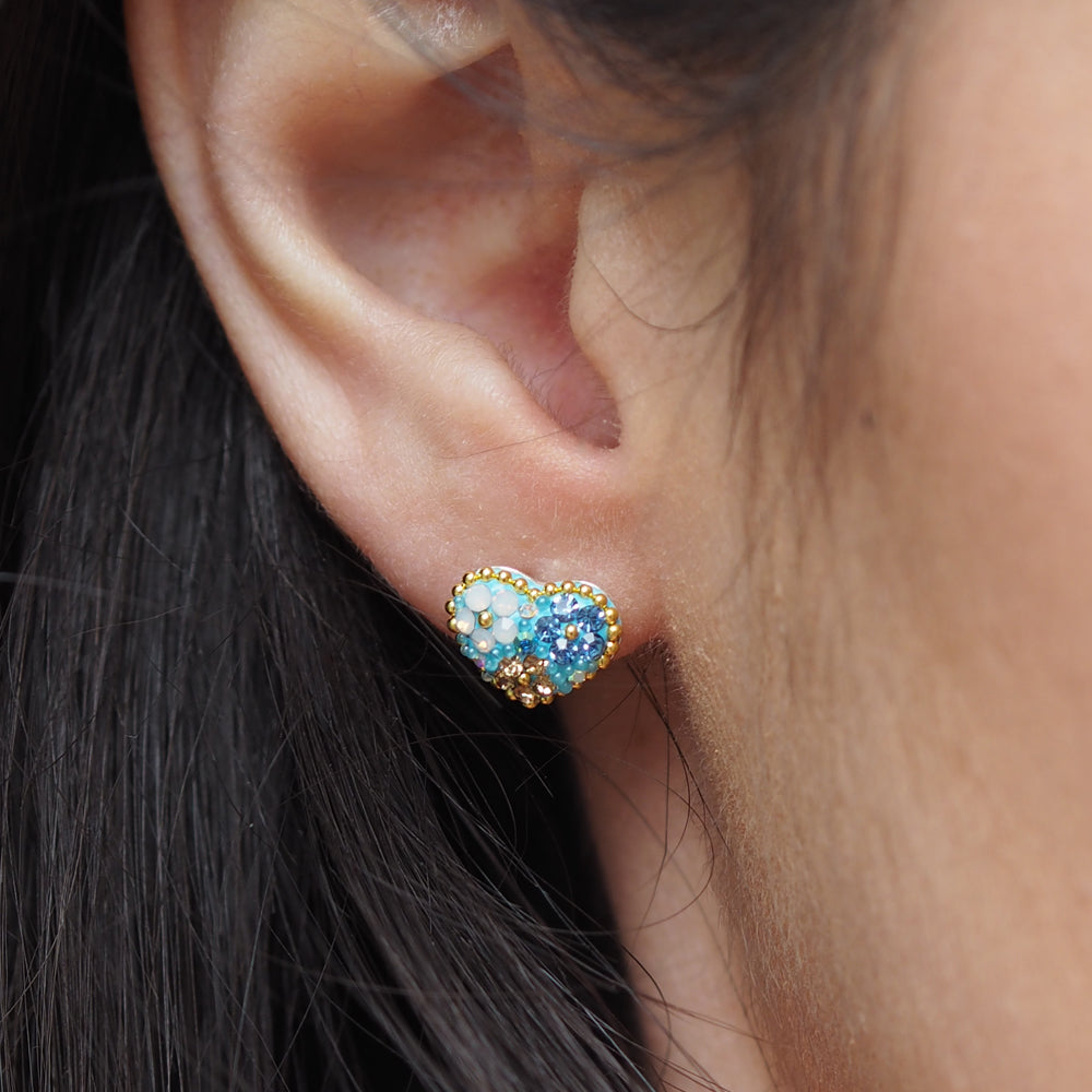 turquoise heart stud earrings worn on ear lightweight