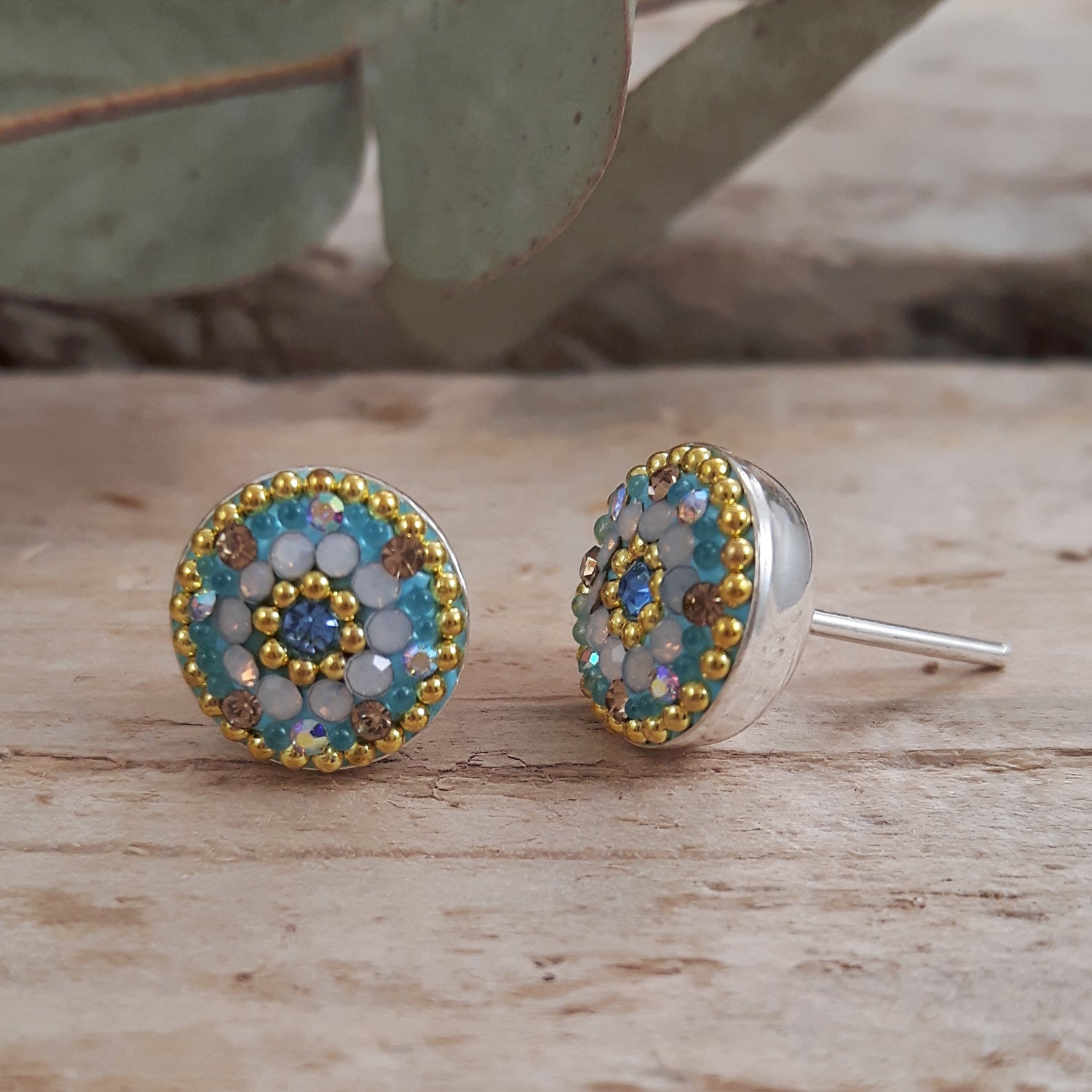 close up turquoise daisy stud earrings sterling silver handmade micro bead detail
