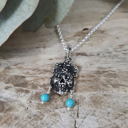 Turquoise hotsell skull necklace
