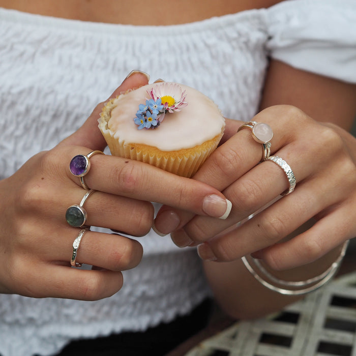 Fairtrade sterling silver ring with emerald cut amethyst