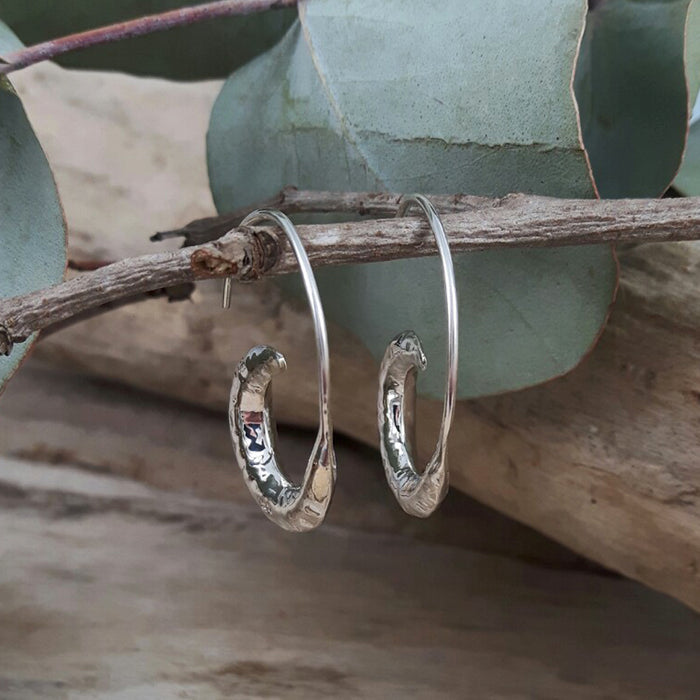 Unusual silver sales hoop earrings