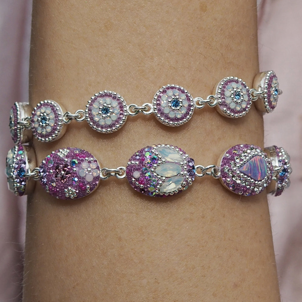 lilac bracelets worn together on wrist statement