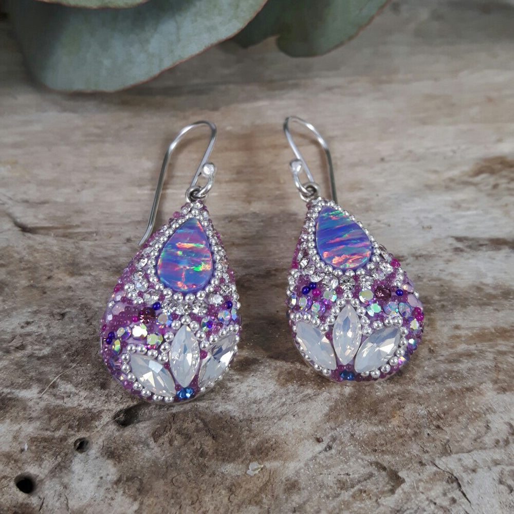 close up lilac statement earrings opal centre detail