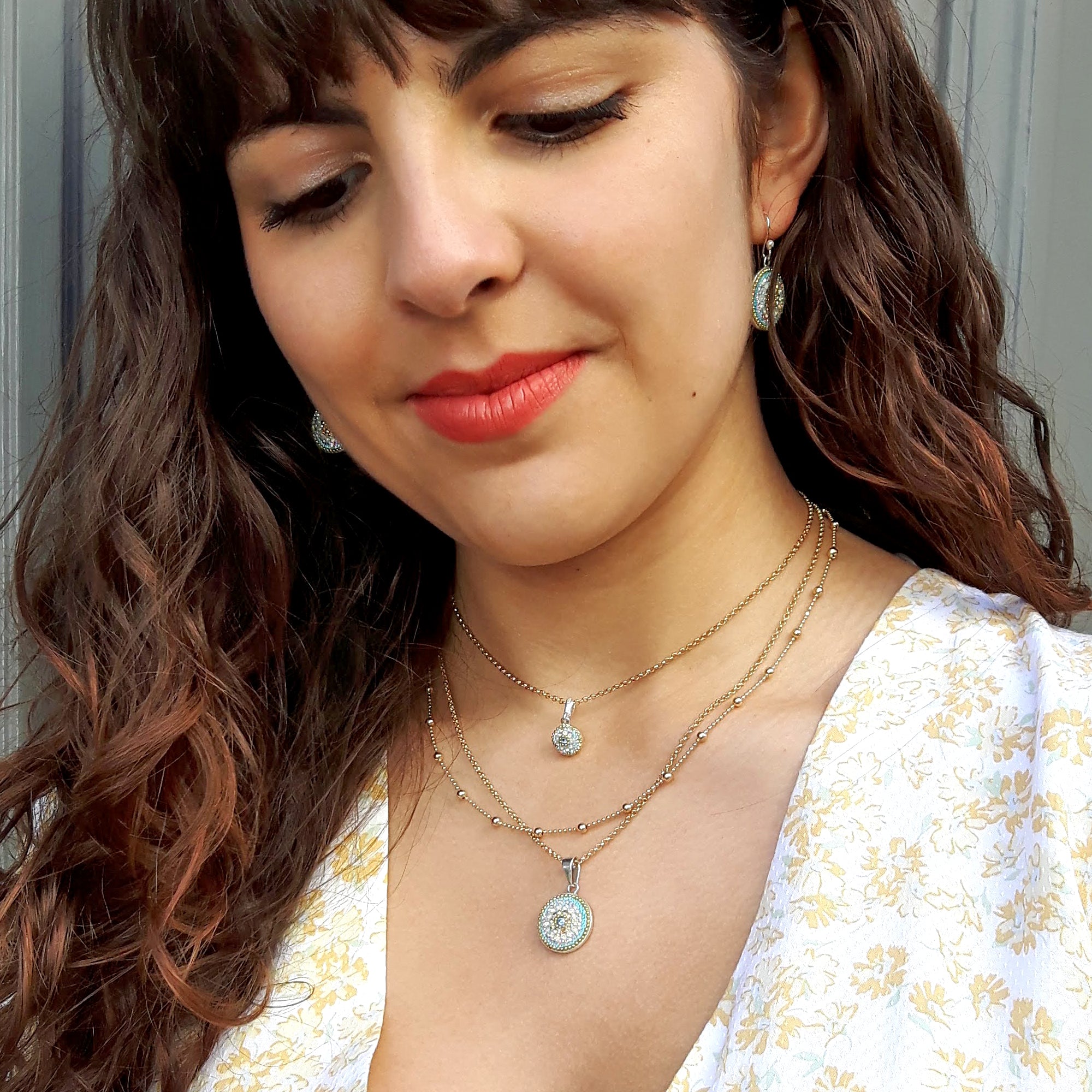 turquoise coin pendant worn necklace