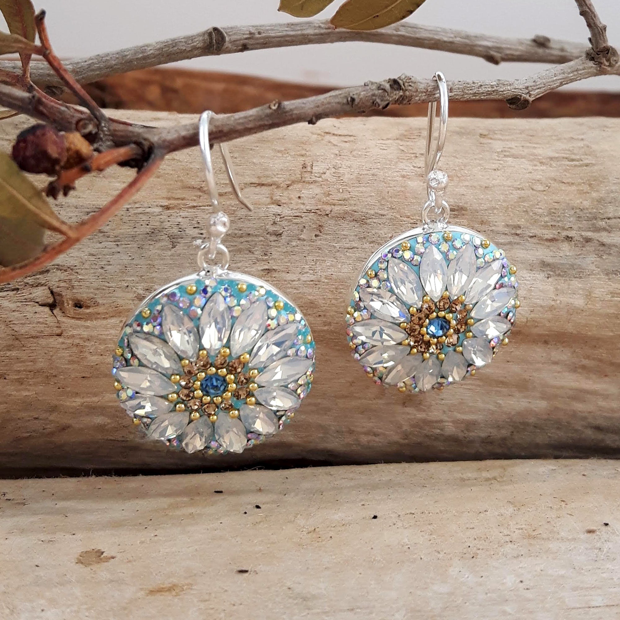 close up daisy disc earrings crystal and micro bead detail