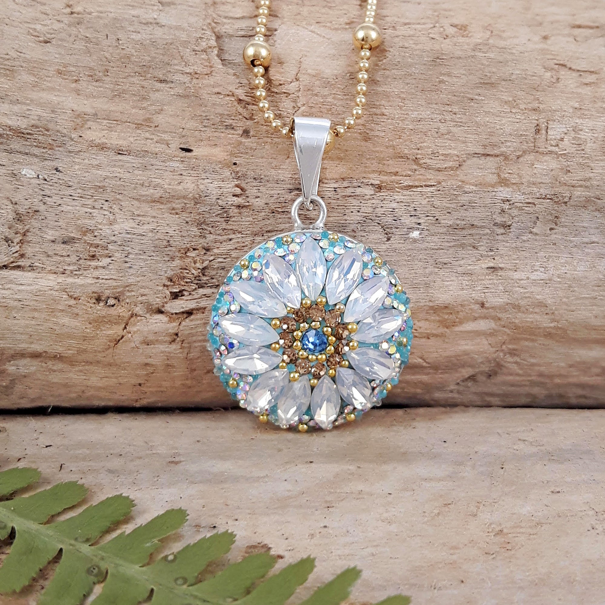 close up daisy disc pendant crystal detail